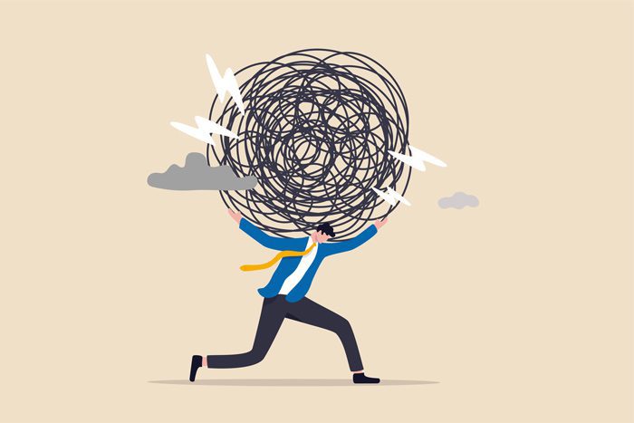 illustration of man carrying a ball of stress - anxiety