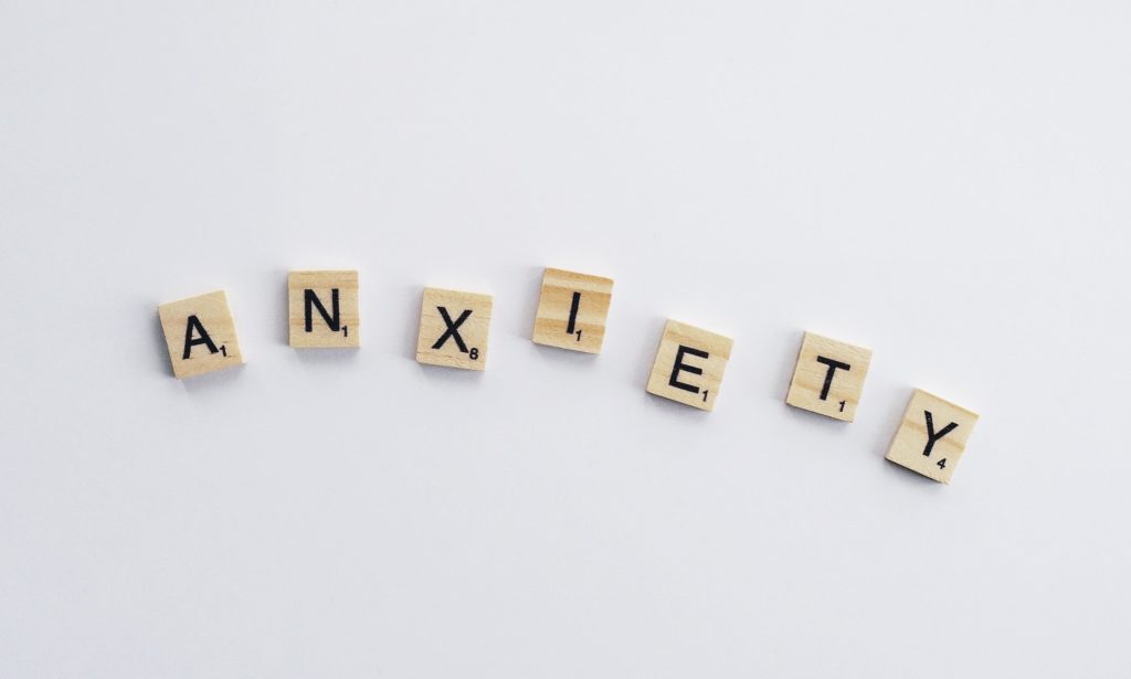 scrabble letters spell anxiety