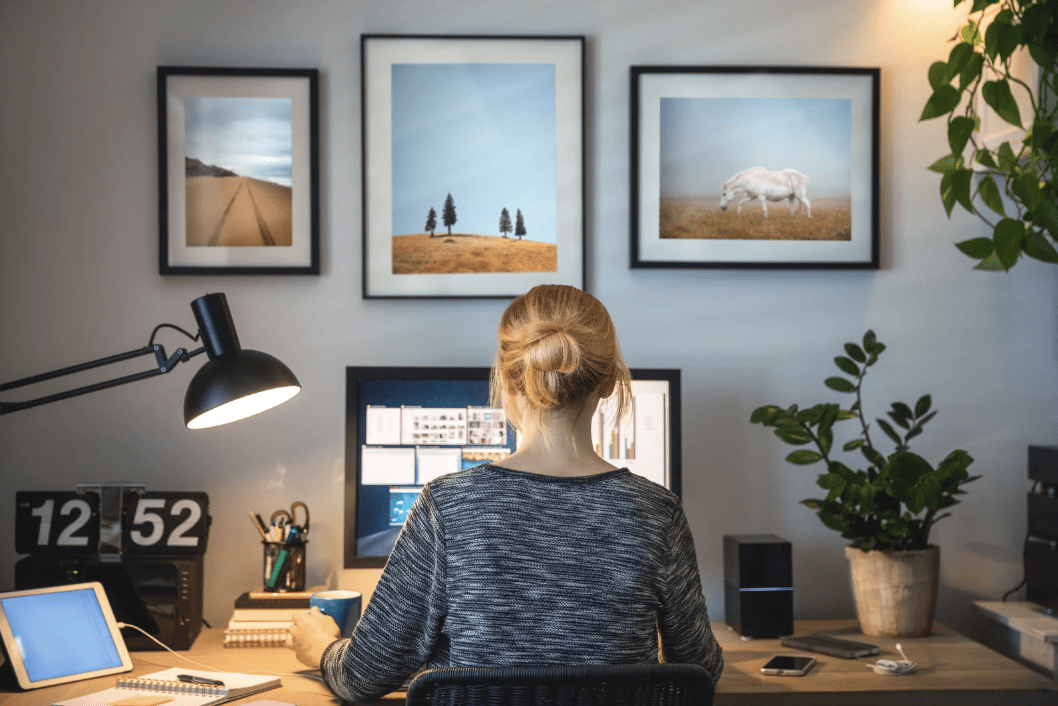 A woman working at a desk.