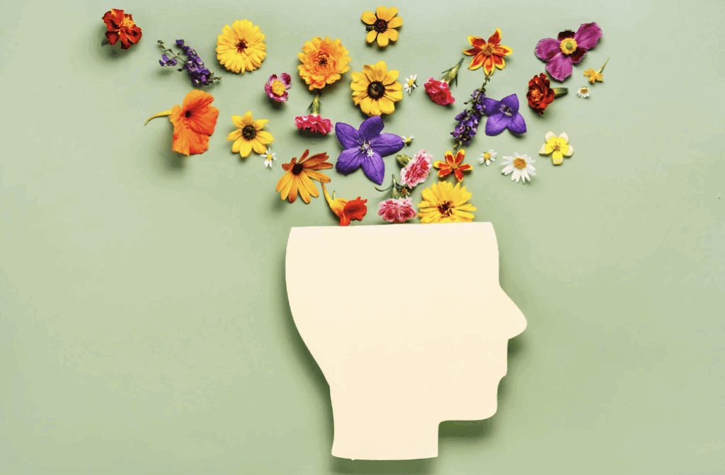 Image of a head with flowers on top.